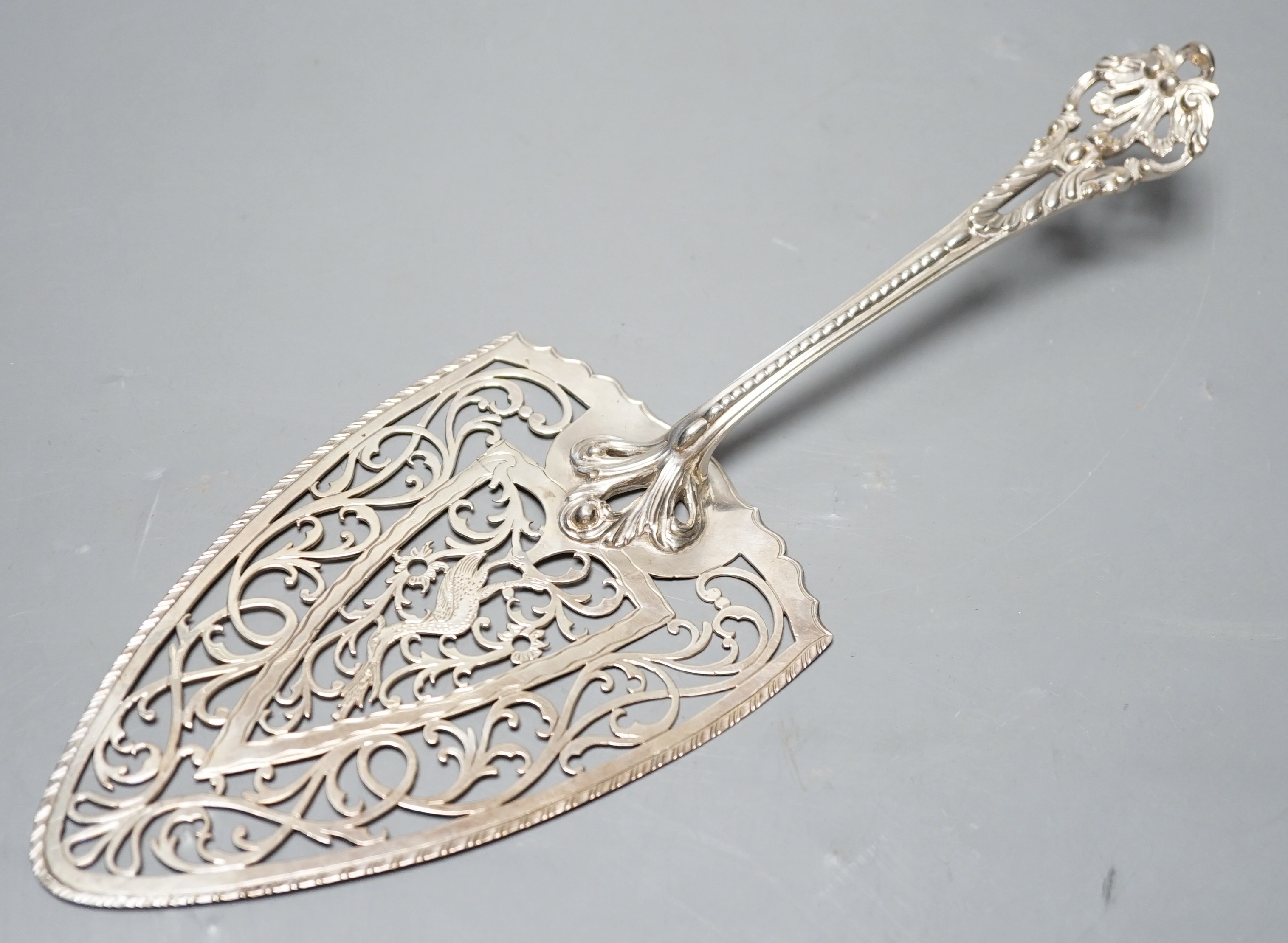 An ornate George III pierced silver server, Aldridge & Green, London, 1770, 28.8cm, 4.5oz.